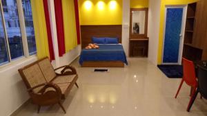 Postel nebo postele na pokoji v ubytování Adams Wood House Ayurveda Homestay Kochi