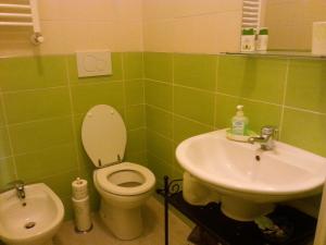 Kúpeľňa v ubytovaní Home 103