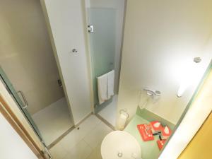 Koupelna v ubytování HARRIS Hotel Sentul City Bogor