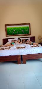 Lova arba lovos apgyvendinimo įstaigoje Ubud Taksu Homestay