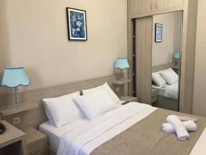 Voodi või voodid majutusasutuse Family Hotel Triston toas