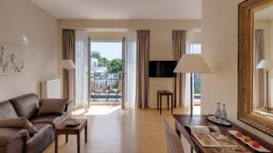 TV a/nebo společenská místnost v ubytování Hotel Villa Medici