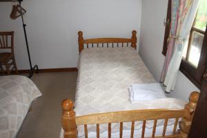 Postel nebo postele na pokoji v ubytování Hôtel Le Relais de Piau