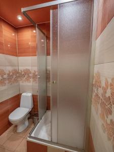 Ein Badezimmer in der Unterkunft MaxxRoyal Hotel
