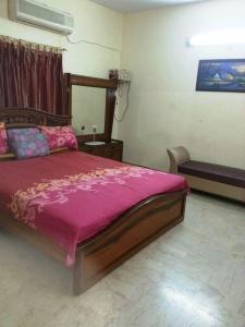 Ένα ή περισσότερα κρεβάτια σε δωμάτιο στο Rehaish Inn Furnished Rental Accommodation