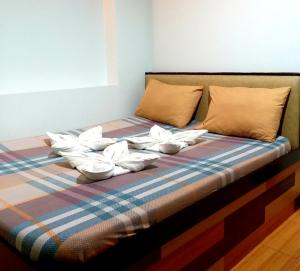 Postel nebo postele na pokoji v ubytování Sola Eleganza Apartelle