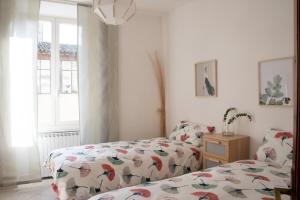 A bed or beds in a room at Alloggio Turistico al Civico n 32