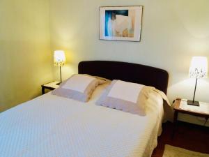 מיטה או מיטות בחדר ב-La Gracette