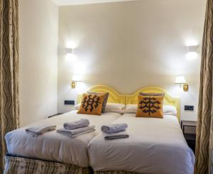 Łóżko lub łóżka w pokoju w obiekcie Turistic Apartment Sevillanos SL