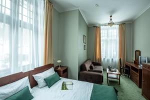 Posedenie v ubytovaní Villa Elise Park Pension