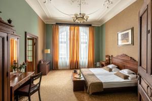Posteľ alebo postele v izbe v ubytovaní Villa Elise Park Pension