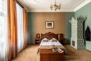Posteľ alebo postele v izbe v ubytovaní Villa Elise Park Pension