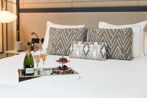 CoolRooms Palacio de Atocha房間的床
