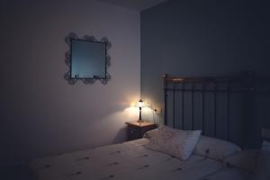 Postel nebo postele na pokoji v ubytování La Juderia de Las Arribes