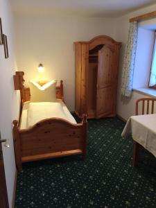 Postel nebo postele na pokoji v ubytování Pension Gregory