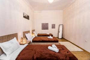 מיטה או מיטות בחדר ב-Comfortable House on Marjanishvili