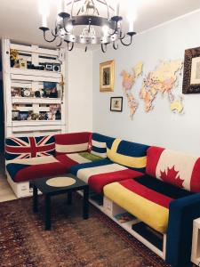 a living room filled with furniture and decor at Scotch Hostel in Volgograd