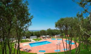 an image of a swimming pool at a resort at Maistra Camping Polari Mobile homes in Rovinj