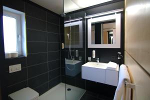 Koupelna v ubytování ME Hotel by WMM Hotels