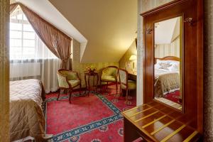 Postel nebo postele na pokoji v ubytování Hotel Atlas Deluxe