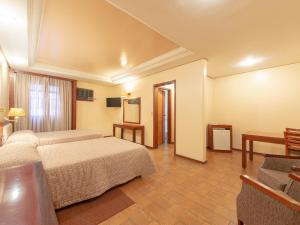 Cama ou camas em um quarto em Real Castilha Hotel mais 37 fotos
