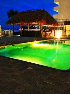The swimming pool at or close to Emerald Shores Hotel - Daytona Beach