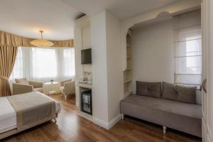 Postel nebo postele na pokoji v ubytování Hotel Yasmak Sultan