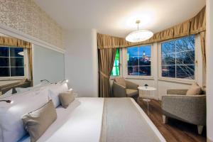 Postel nebo postele na pokoji v ubytování Hotel Yasmak Sultan