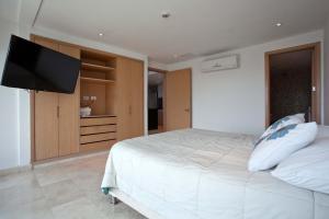 Łóżko lub łóżka w pokoju w obiekcie Great Apartment Luxury and Comfort