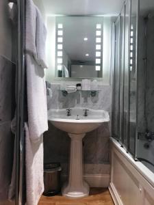 A bathroom at The Angel Inn, Boutique B&B and Tea Rooms 