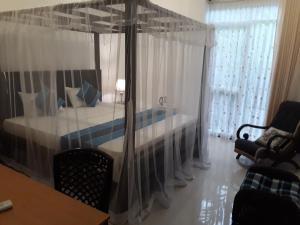 Postel nebo postele na pokoji v ubytování Villa Olga