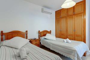 Posteľ alebo postele v izbe v ubytovaní Villa Fort View