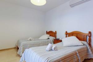 Posteľ alebo postele v izbe v ubytovaní Villa Fort View