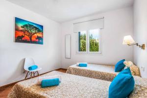 Postel nebo postele na pokoji v ubytování Villa Velazco + 14 fotografií