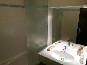 Ванная комната в Hôtel La Vanoise