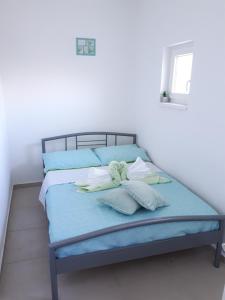 Ένα ή περισσότερα κρεβάτια σε δωμάτιο στο Spider Apartments