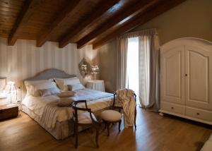 Postel nebo postele na pokoji v ubytování Klanjscek Wine&Stay