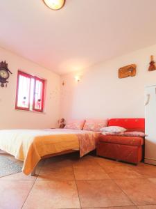Postel nebo postele na pokoji v ubytování Apartments Nives NB