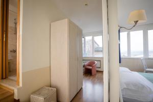 Postel nebo postele na pokoji v ubytování Hotel Duomo
