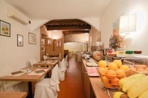 A restaurant or other place to eat at Hotel Duomo