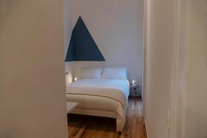 A bed or beds in a room at Interno21