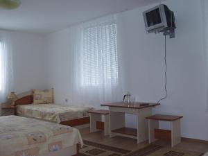 TV a/nebo společenská místnost v ubytování Стаи за гости "Нина"