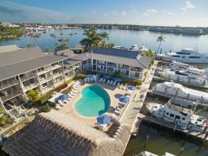 an aerial view of a resort with a marina at Cove Inn on Naples Bay in Naples