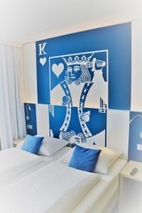
Ein Bett oder Betten in einem Zimmer der Unterkunft IBB Blue Hotel Paderborn
