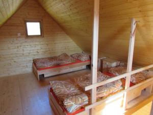 Postel nebo postele na pokoji v ubytování Rybářská Chata U Sumce