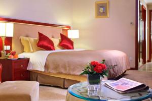 Cama o camas de una habitación en Xinhai Jin Jiang Hotel