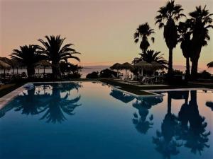 Bazén v ubytování Clara Resort nebo v jeho okolí