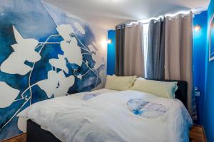 Ein Bett oder Betten in einem Zimmer der Unterkunft Captain's Place