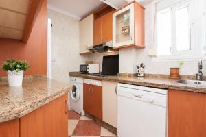 Kuchyňa alebo kuchynka v ubytovaní Malaga Center Flat Hospitality
