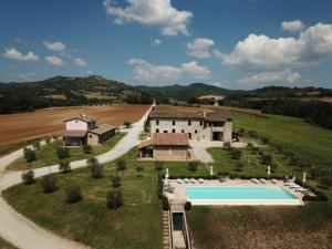 The swimming pool at or close to AGRITURISMO La COLLINA del SOLE